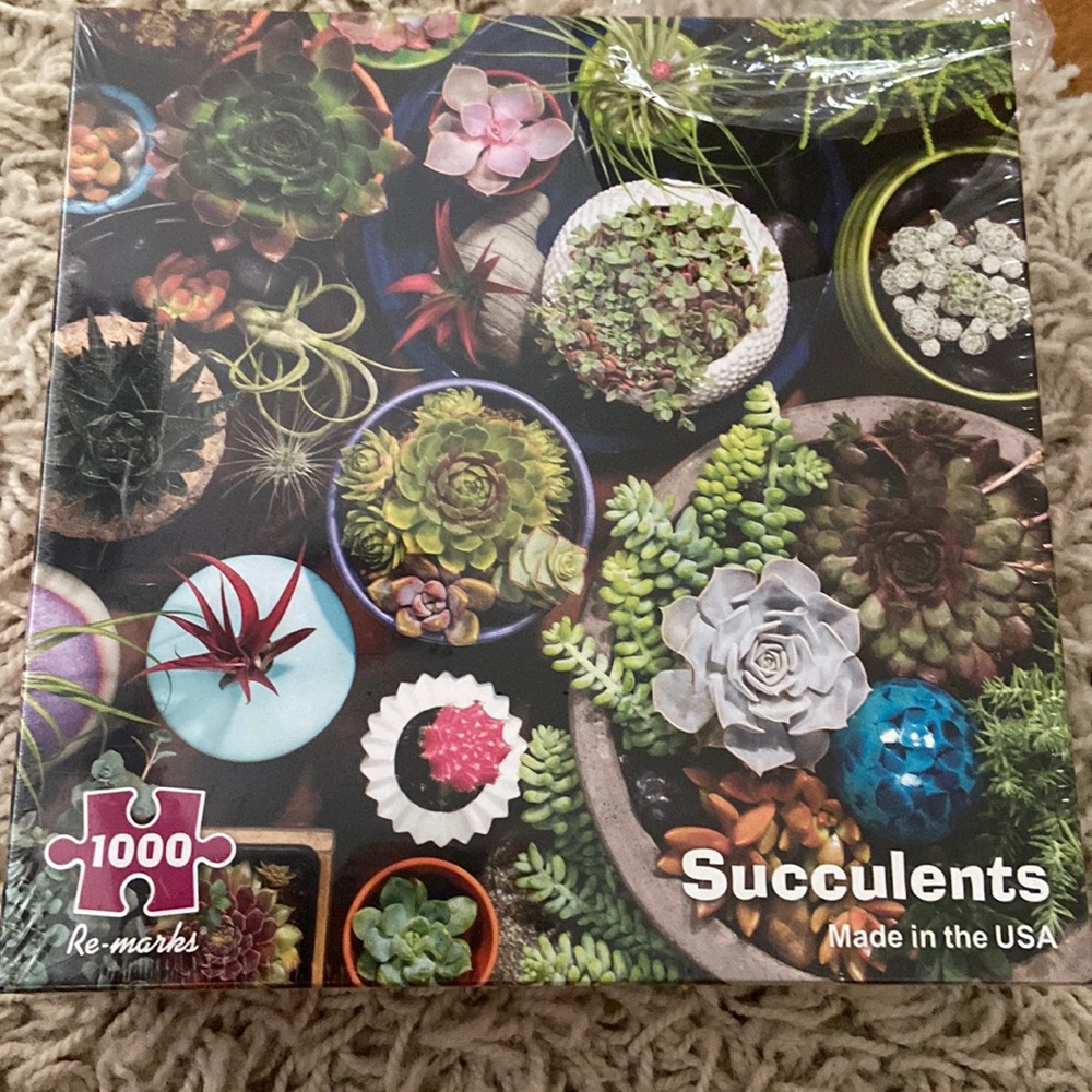 New in plastic re-marks succulent 1000 piece puzzle